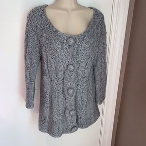 Twiggy cable knit cardigan sweater
